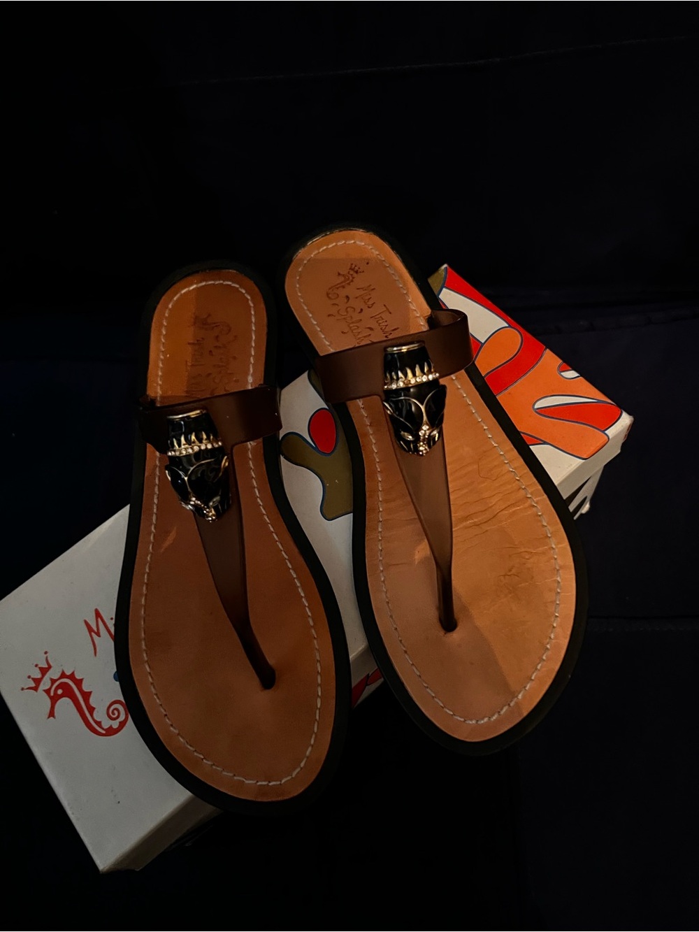 Brown jelly T-Strap Sandals with cougar Metal Accent